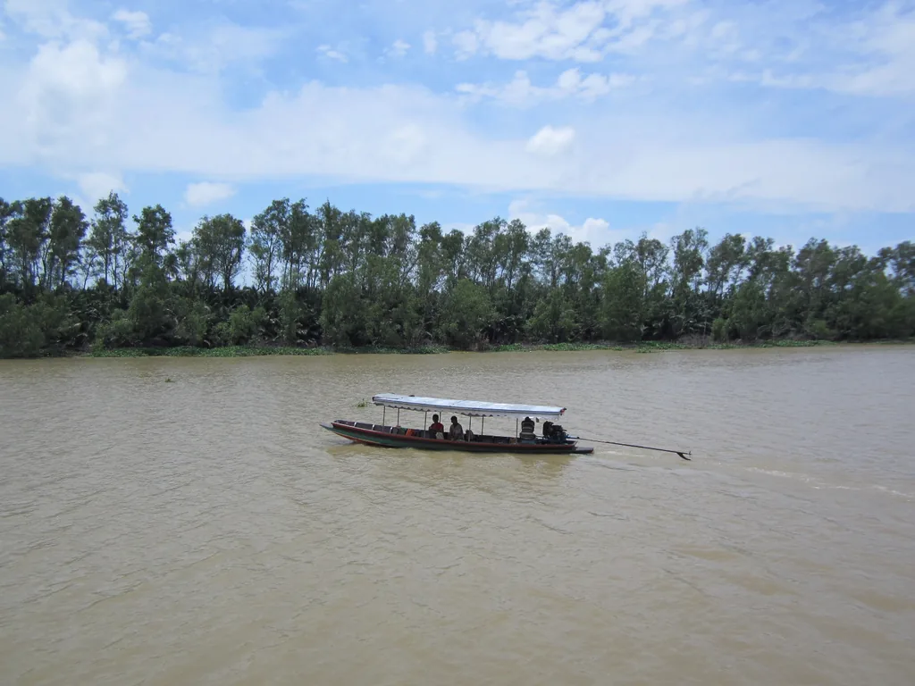 Long-tailed boat moored on the river at Bang Khla, Chachoengsao