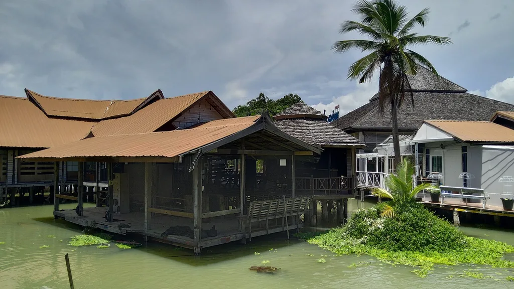 Wooden buildings and walkways of Pattaya Floating Market in Thailand